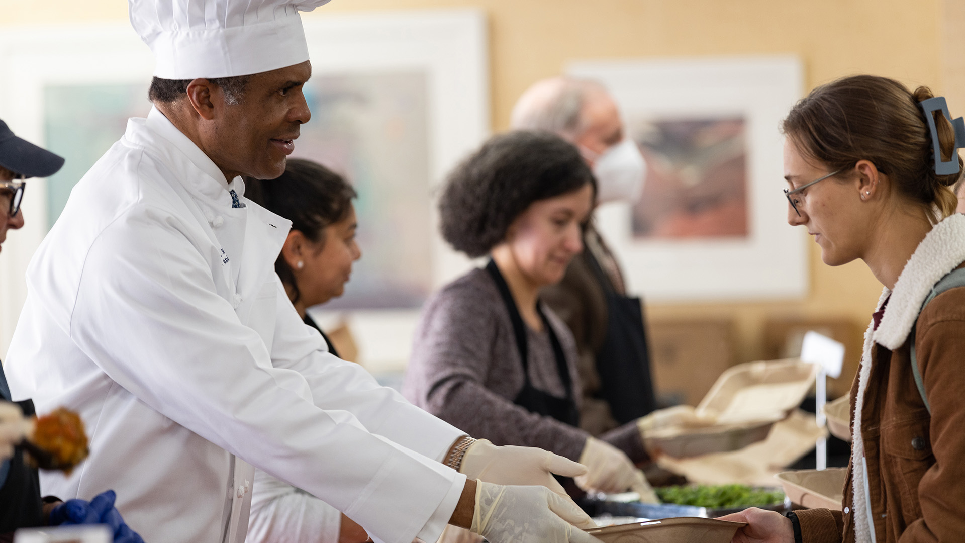 Dr. Philip Ozuah serves Thanksgiving meals to Montefiore Einstein associates