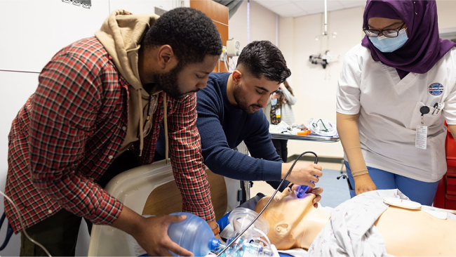 Two medical students and a nursing student engage in interprofessional training at the Montefiore Einstein Center for Innovation in Simulation as part of the Transition to Residency course.