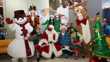 Santa and his team visit with CHAM.  There's a snowman, a reindeer, a nutcracker and other characters.