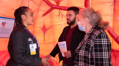 Staff and participants meet inside the special event pavilion for stroke awareness and prevention.