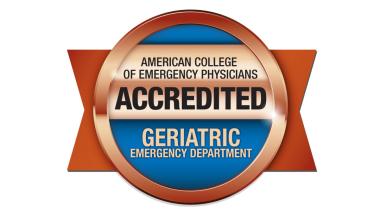 "American College of Emergency Physicians Accredited Geriatric Emergency Department" award plaque in metallic copper and blue.